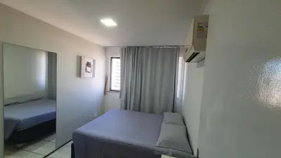 Uma cama ou camas num quarto em Ed Dragao do Mar, 1704 Iracema