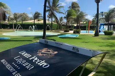 Um jardim no exterior de Apartamento em Fortaleza - CE