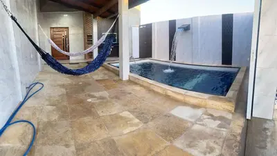 A piscina em ou perto de Nova casa de praia na Caponga