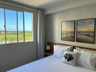 Uma cama ou camas num quarto em Aos Pés do Mar