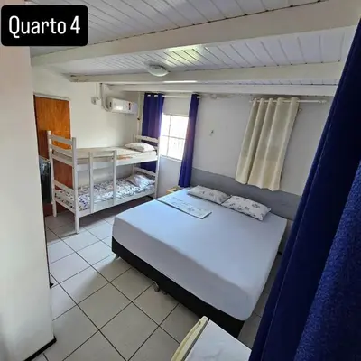 Uma cama ou camas num quarto em Dias de Sol & Mar - Fortaleza 2