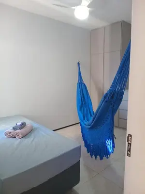 Uma cama ou camas num quarto em Aconchego e Localização