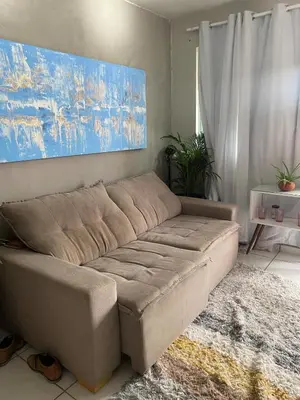 Uma área de estar em Apartamento 2 quartos Next to Beira Mar
