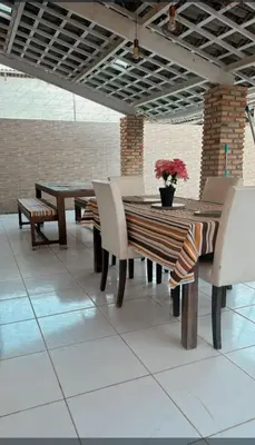 Uma área de estar em Cris hospedagem
