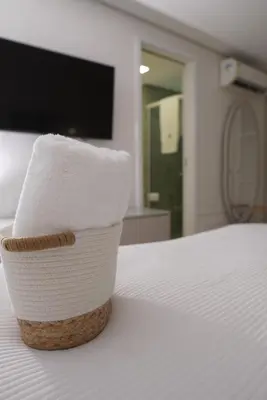 Uma cama ou camas num quarto em GolfVille - Lazer e Conforto