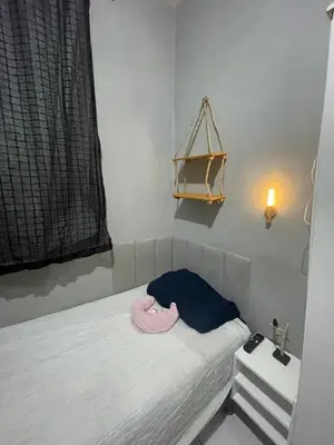 Uma cama ou camas num quarto em Apartamento no centro de Fortaleza