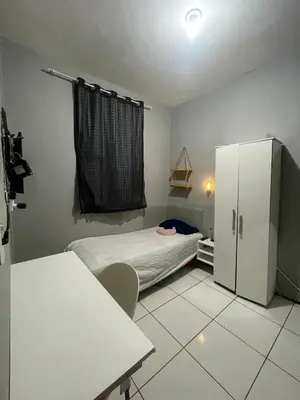 Uma cama ou camas num quarto em Apartamento no centro de Fortaleza