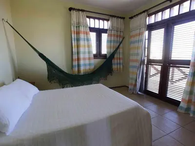 Uma cama ou camas num quarto em Casa de praia - águas belas