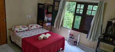Uma cama ou camas num quarto em Recanto da Felicidade