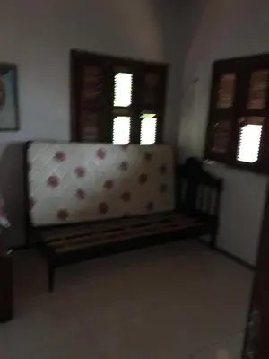 Uma área de estar em Casa com piscina Novo Iguape