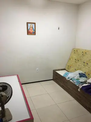 Uma cama ou camas num quarto em Casa com piscina Novo Iguape
