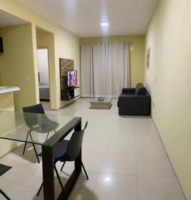 Uma televisão e/ou sistema de entretenimento em Apartamento Kite Village Deluxe Cumbuco