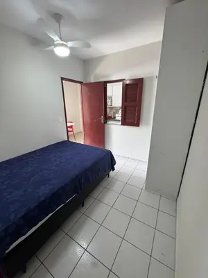 Uma cama ou camas num quarto em Apartamento no Centro