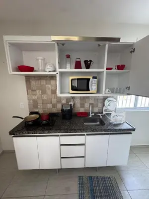 A cozinha ou kitchenette de Apartamento no Centro