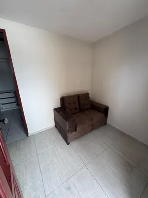Uma área de estar em Apartamento no Centro