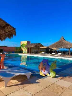A piscina em ou perto de Hotel das Falésias Praia das Fontes