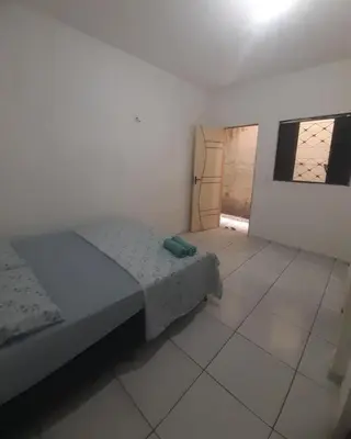 Uma cama ou camas num quarto em Centro - Praia de Iracema - Pousada Panorama do Mar