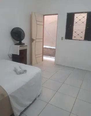Uma cama ou camas num quarto em Centro - Praia de Iracema - Pousada Panorama do Mar