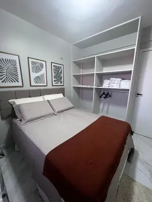 Uma cama ou camas num quarto em Apartamento no Porto das Dunas