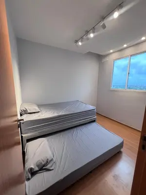 Uma cama ou camas num quarto em Castelão Apartment