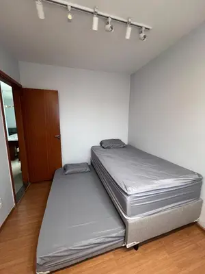 Uma cama ou camas num quarto em Castelão Apartment