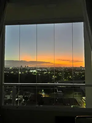 O nascer ou o pôr do sol visto a partir do apartamento