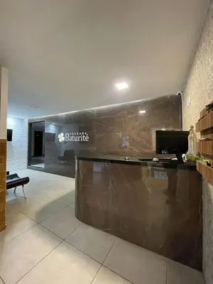 Uma televisão e/ou sistema de entretenimento em Hotel Pousada Baturité FORTALEZA