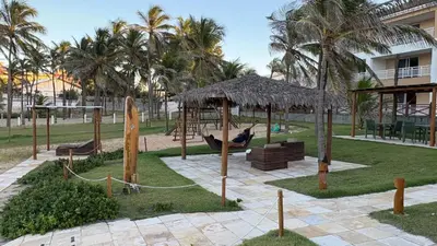 Um jardim no exterior de Porto das Dunas - Atlantic Palace H201
