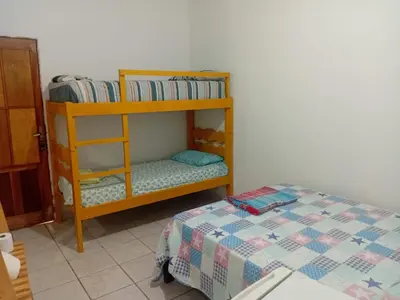 Uma cama ou camas num quarto em Cheguei Preá