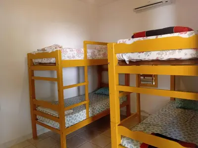 Uma cama ou camas num quarto em Cheguei Preá