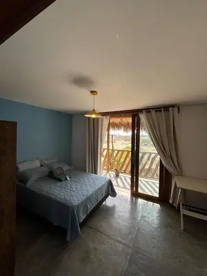 Uma cama ou camas num quarto em Vista do Sol Jeri