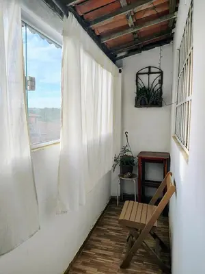 Uma área de estar em Apartamento aconchegante Cumbuco
