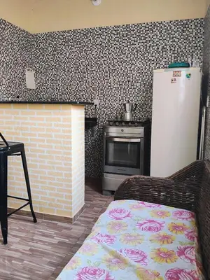 A cozinha ou kitchenette de Apartamento aconchegante Cumbuco