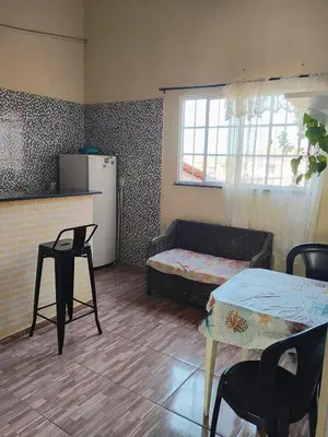 A cozinha ou kitchenette de Apartamento aconchegante Cumbuco