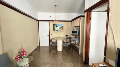 Uma televisão e/ou sistema de entretenimento em Villa costeira Flat
