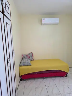 Uma cama ou camas num quarto em Sua Casa fora de Casa