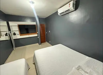 Uma cama ou camas num quarto em Cumbuco, Casa de praia