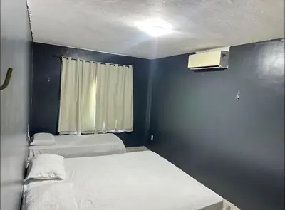 Uma cama ou camas num quarto em Cumbuco, Casa de praia