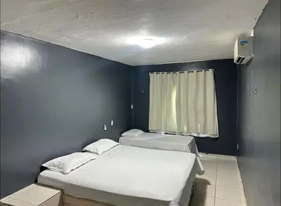 Uma cama ou camas num quarto em Cumbuco, Casa de praia