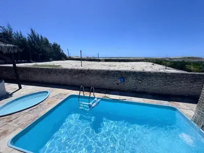 A piscina em ou perto de Splendide villa à morro branco vue sur mer