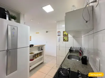 A cozinha ou kitchenette de Porto Beach Residence