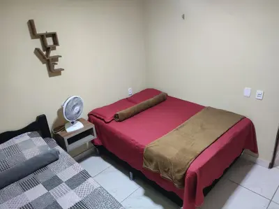 Uma cama ou camas num quarto em Chalé aconchego do Áureo 2