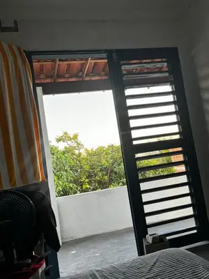 Uma cama ou camas num quarto em Casa de Veraneio