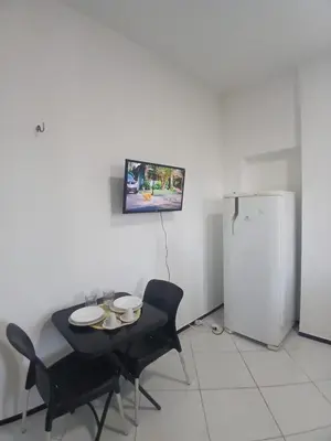 Uma televisão e/ou sistema de entretenimento em Sua acomodação pertinho de tudo!!
