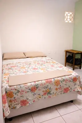 Uma cama ou camas num quarto em Paraíso Pedra Encantada