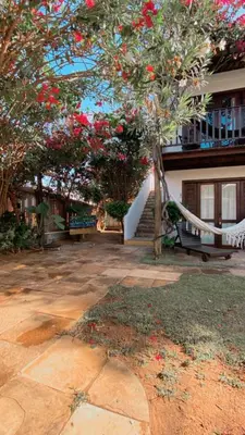 Um jardim no exterior de Villa Albergaria