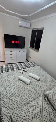 Uma cama ou camas num quarto em Tesouro da Maraponga