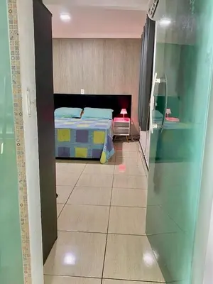 Uma cama ou camas num quarto em Apê aconchegante na praia