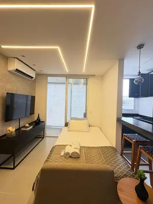 Uma cama ou camas num quarto em Luxo Mirante na Praia do Futuro