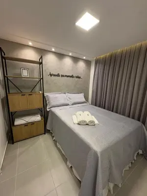 Uma cama ou camas num quarto em Luxo Mirante na Praia do Futuro